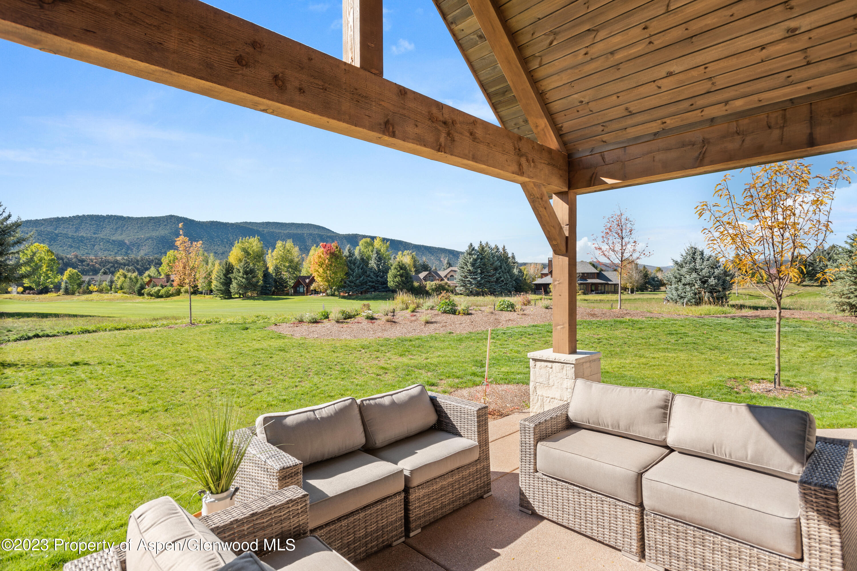 175 Diamond A Ranch Road Carbondale, CO 81623 - Photo 7 of 26 a view of a patio with couches plants and a big yard