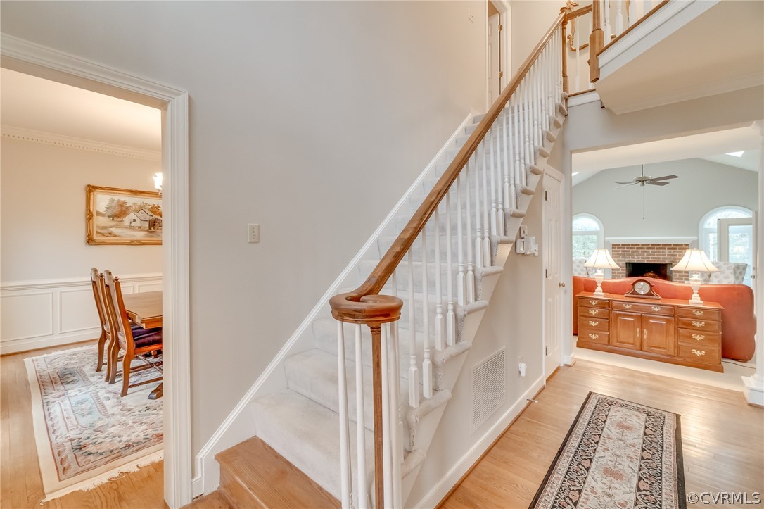 14621 Benefice Ridge Chesterfield, VA 23838 - Photo 13 of 49 a view of entryway and hall with wooden floor