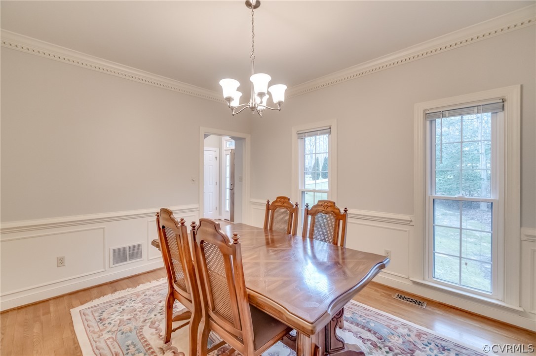 14621 Benefice Ridge Chesterfield, VA 23838 - Photo 20 of 49 a view of a dining room with furniture window and wooden floor