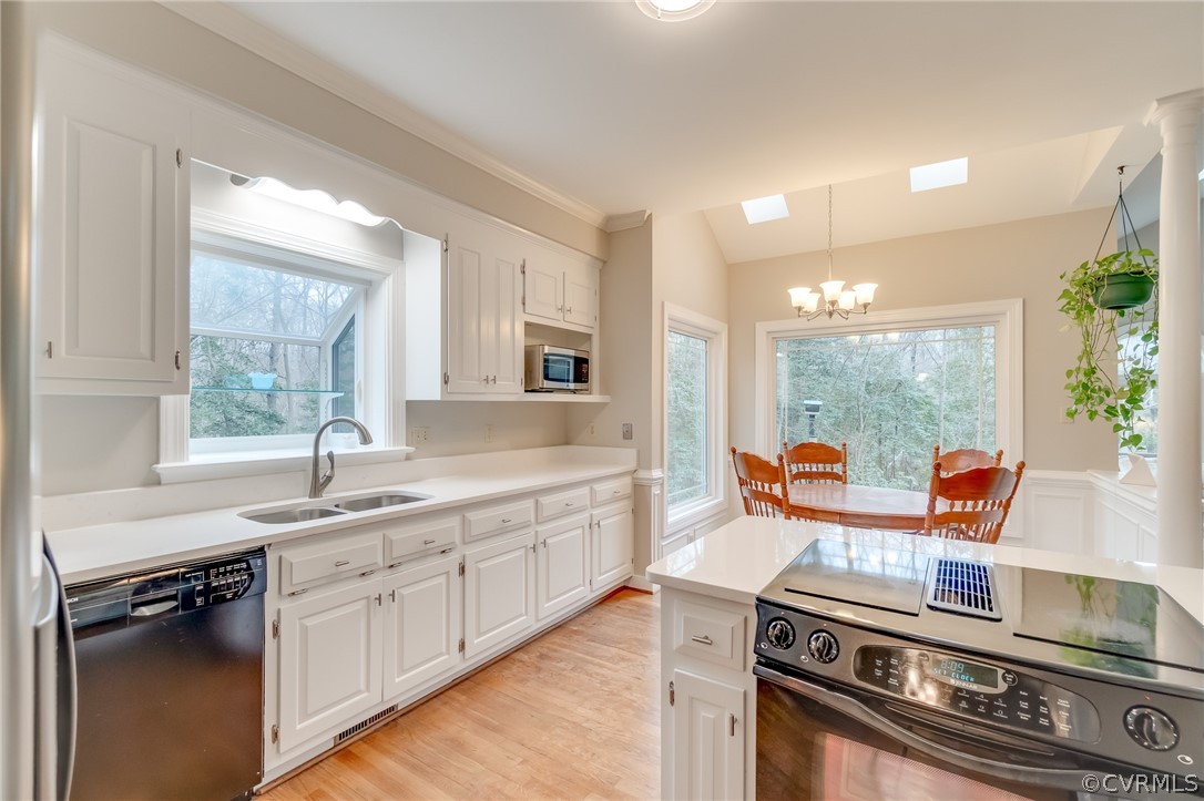 14621 Benefice Ridge Chesterfield, VA 23838 - Photo 21 of 49 a kitchen with stainless steel appliances granite countertop a stove a sink and a refrigerator