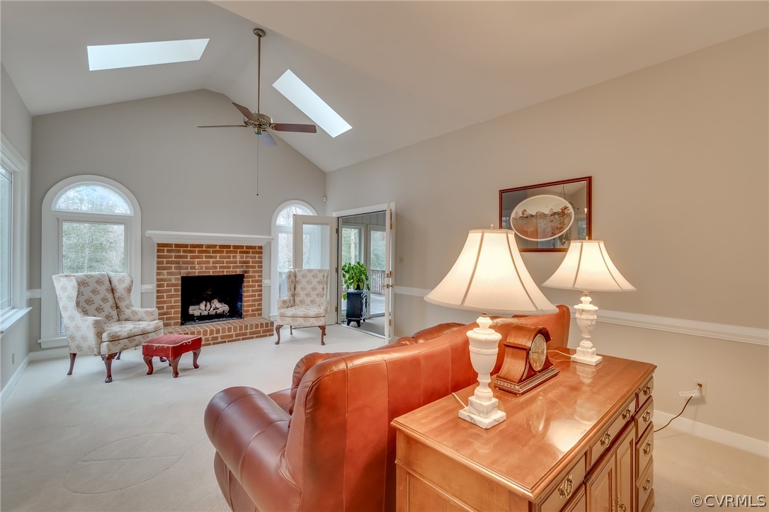 14621 Benefice Ridge Chesterfield, VA 23838 - Photo 27 of 49 a living room with furniture a fireplace and a flat screen tv