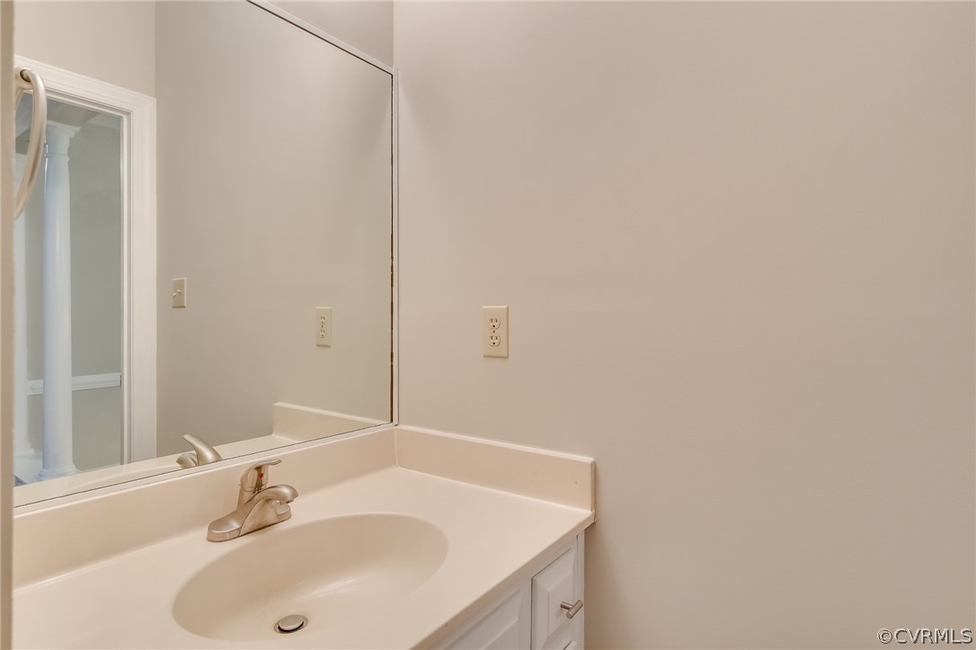 14621 Benefice Ridge Chesterfield, VA 23838 - Photo 33 of 49 a bathroom with a sink and a mirror