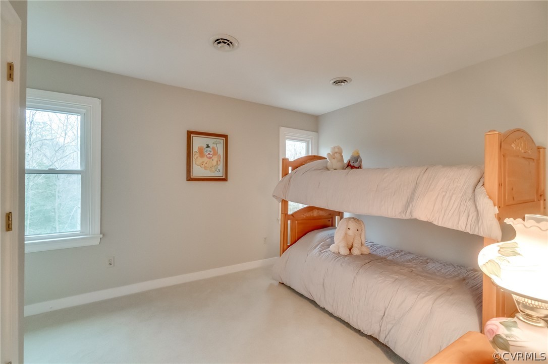 14621 Benefice Ridge Chesterfield, VA 23838 - Photo 36 of 49 a bedroom with a bed and window