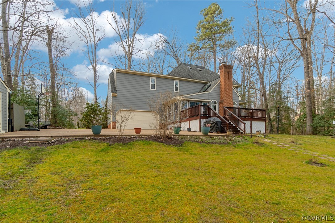 14621 Benefice Ridge Chesterfield, VA 23838 - Photo 4 of 49 a view of a swimming pool with a yard and large trees