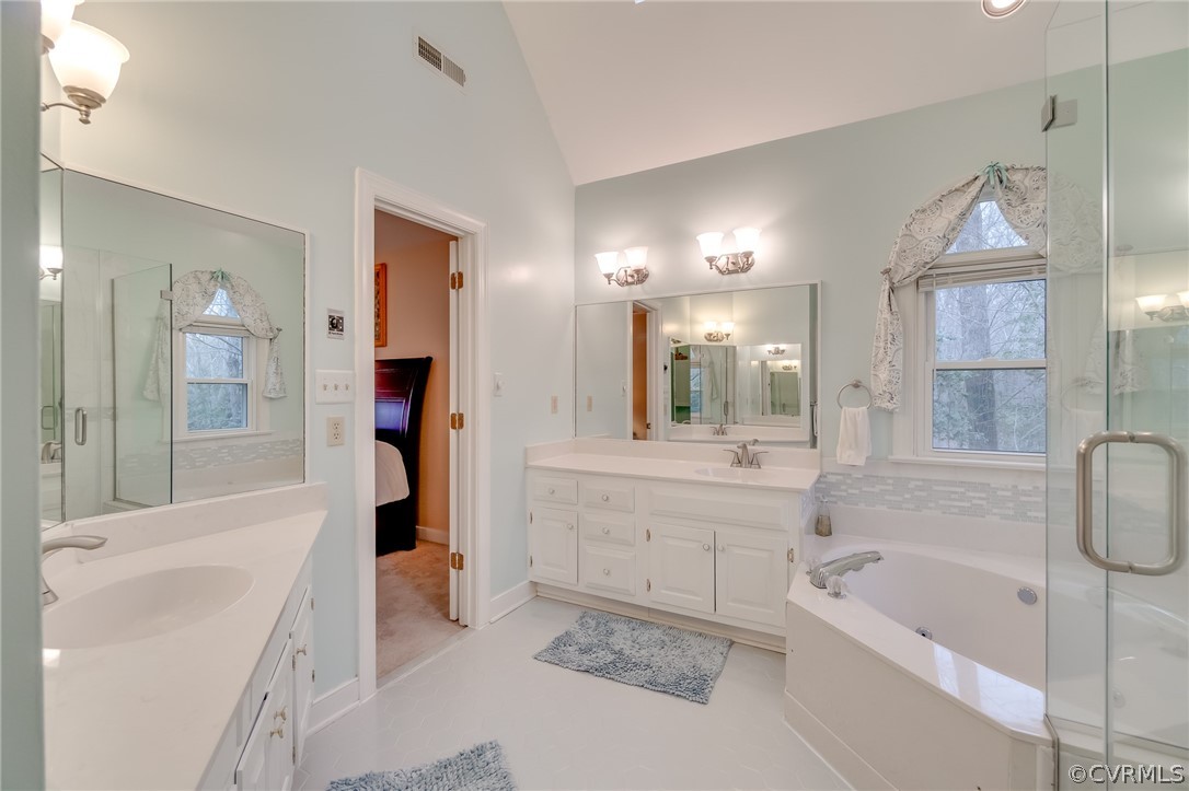 14621 Benefice Ridge Chesterfield, VA 23838 - Photo 47 of 49 a bathroom with a bathtub shower and a sink