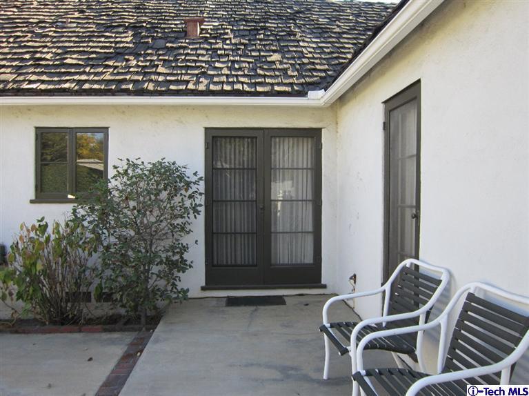 538 Alhambra Road San Gabriel, CA 91775 - Photo 4 of 6 a living room with a couch and a table