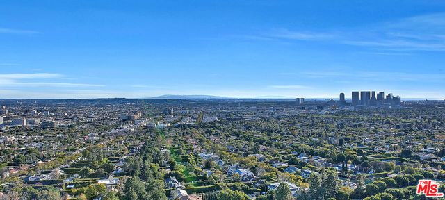 a view of a balcony with wooden floor