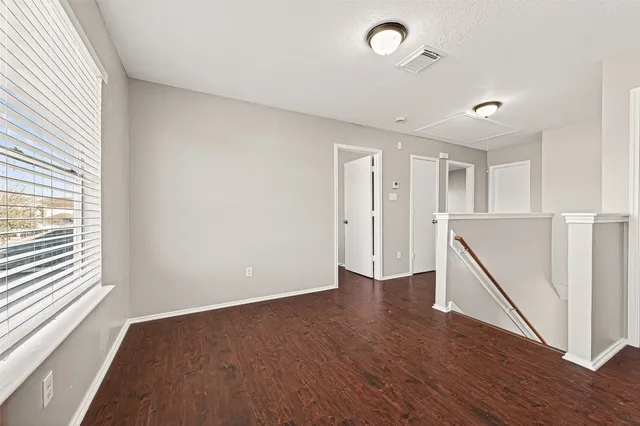 an empty room with windows