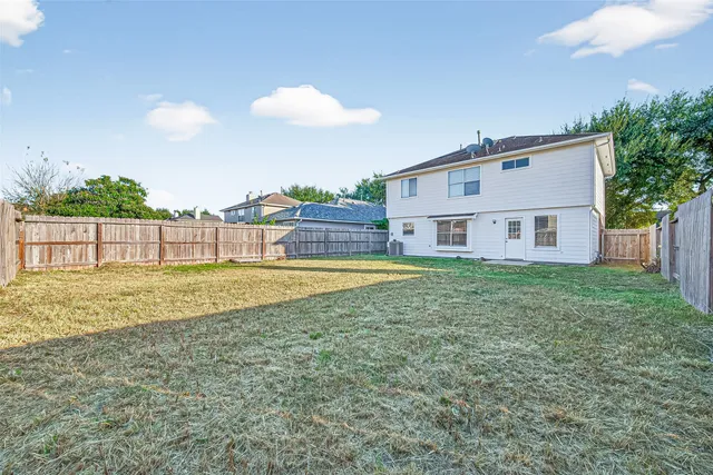 a view of a house with a swimming pool
