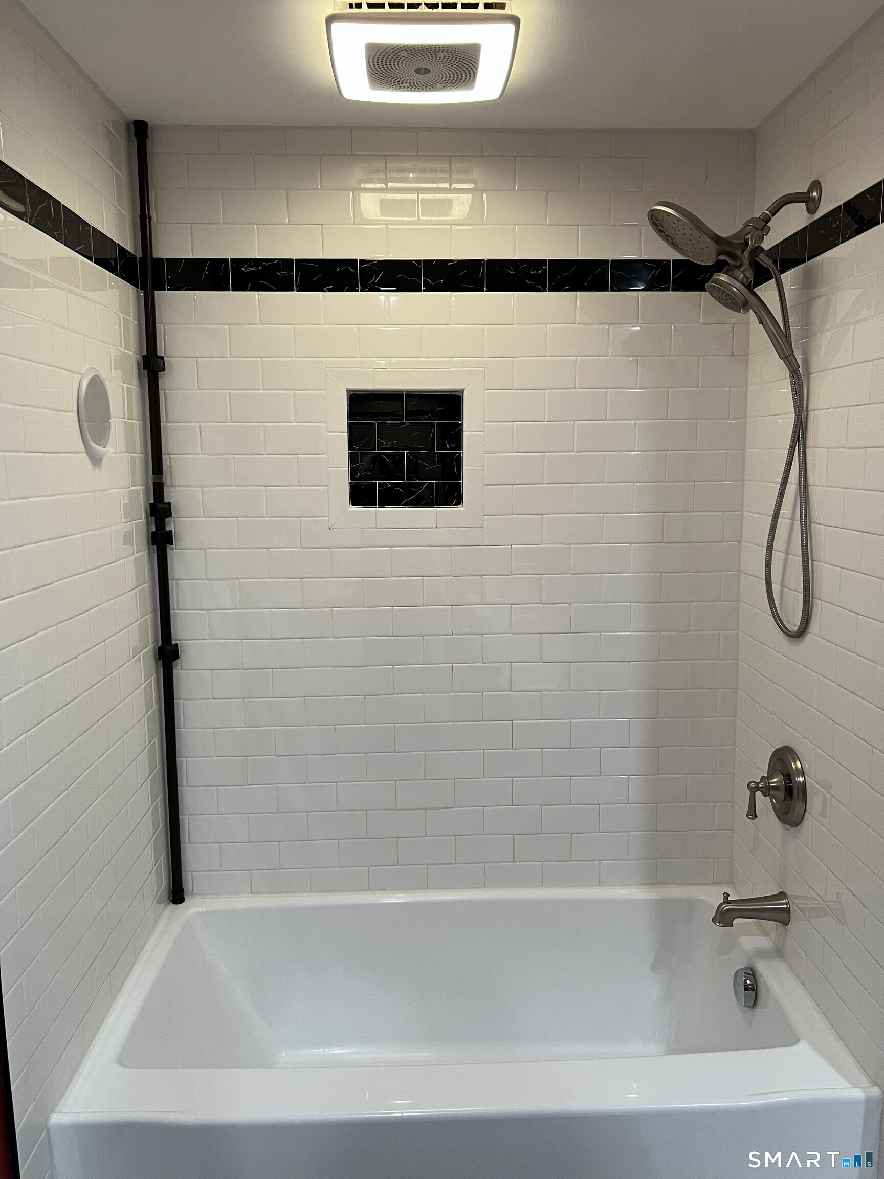 82 Bingham Street Bristol, CT 06010 - Photo 17 of 40 a bathroom with a shower and a bath tub