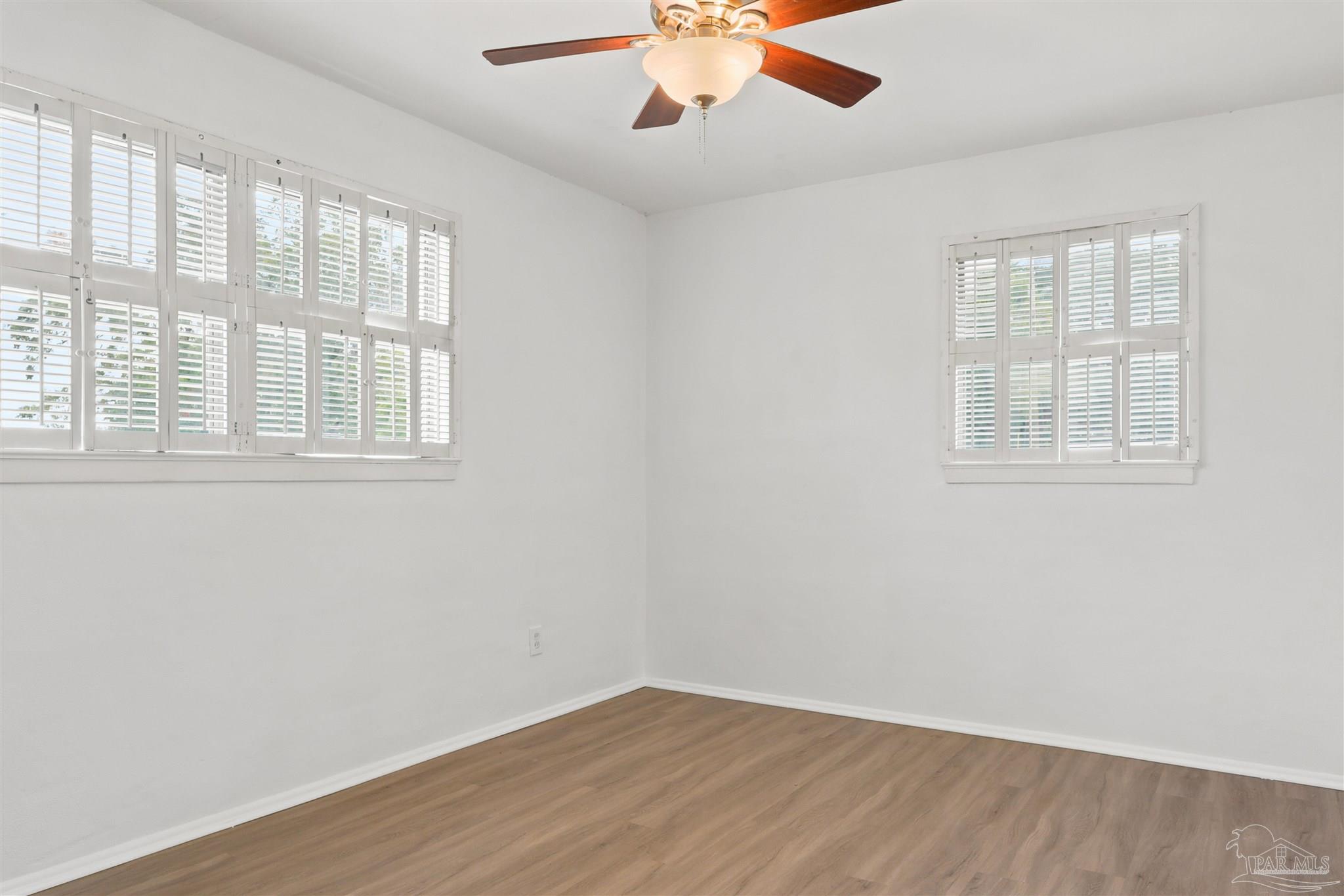 101 Vanderbilt Road Pensacola, FL 32506 - Photo 21 of 33 Bedroom 2, two plantation shutter walls