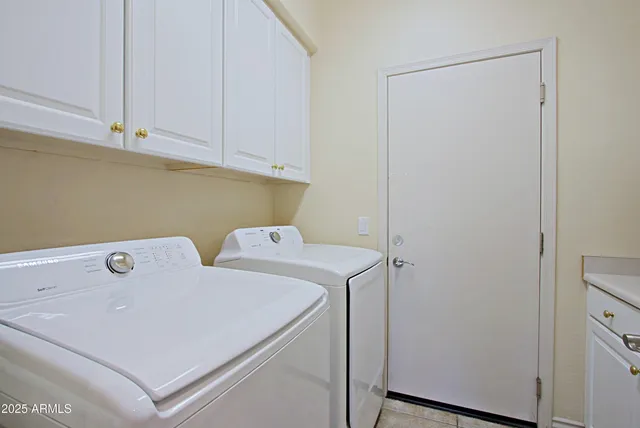 a view of swimming pool with outdoor seating and city view