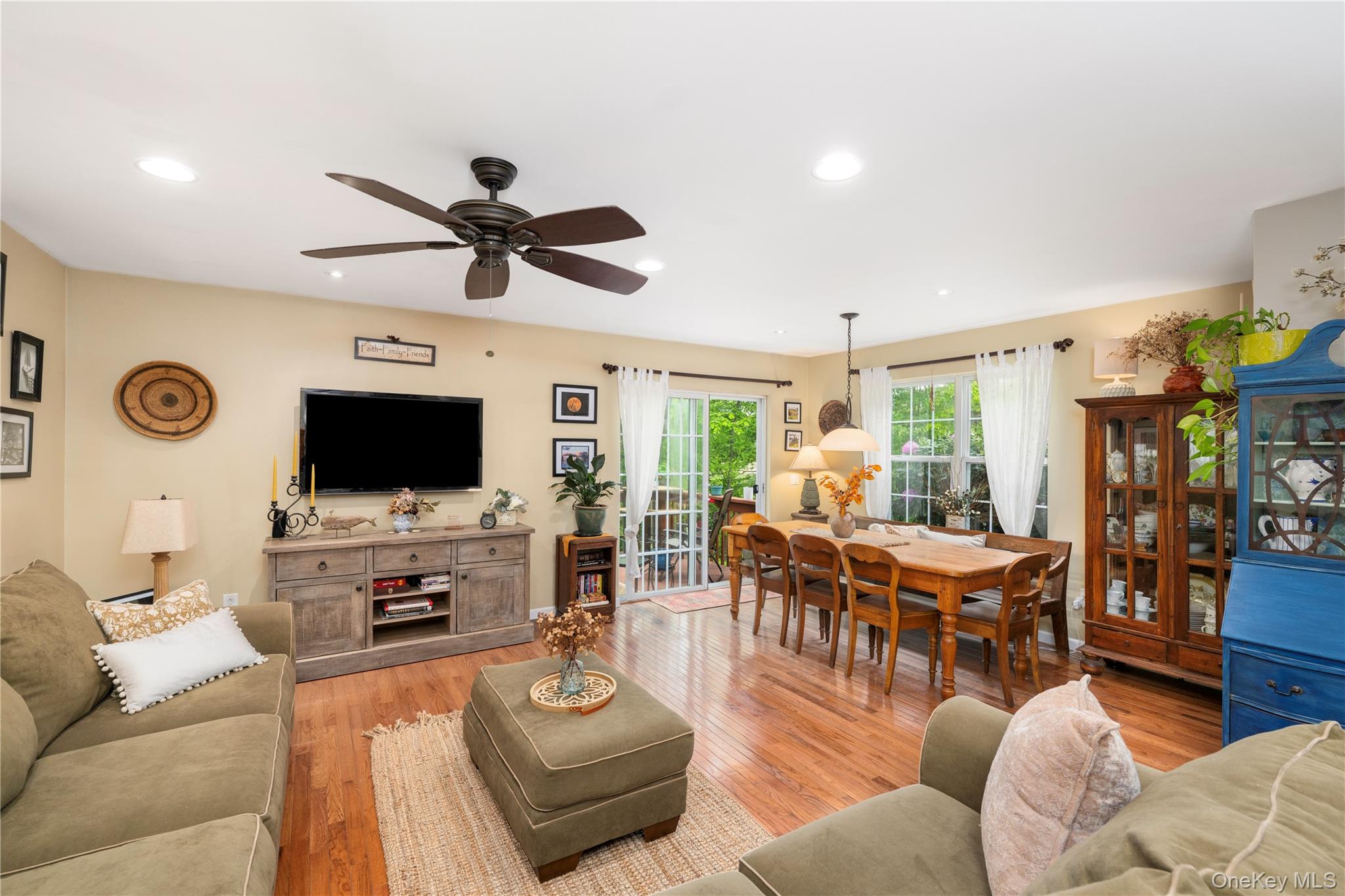 129 Stringham Road, Unit 31 LaGrangeville, NY 12540 - Photo 5 of 26 a living room with furniture a flat screen tv and a window