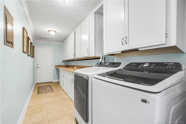 a view of a kitchen with electric appliances