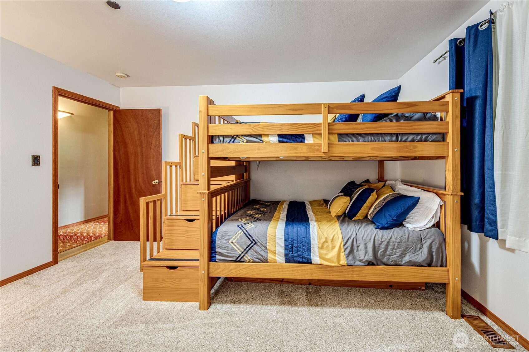 73 Ross Lane Port Angeles, WA 98363 - Photo 18 of 40 a bedroom with furniture and a closet