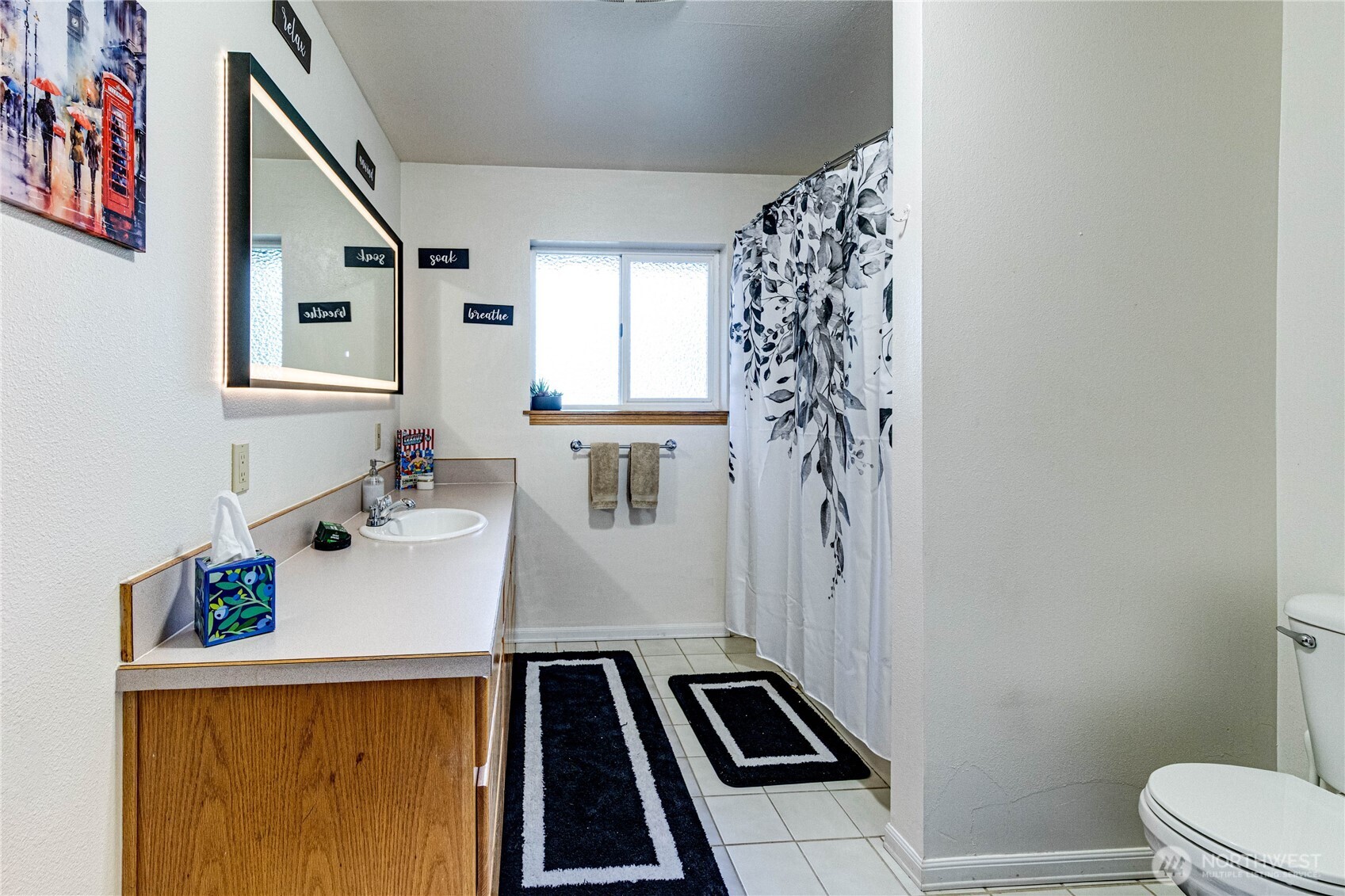 73 Ross Lane Port Angeles, WA 98363 - Photo 19 of 40 a bathroom with a sink and a mirror