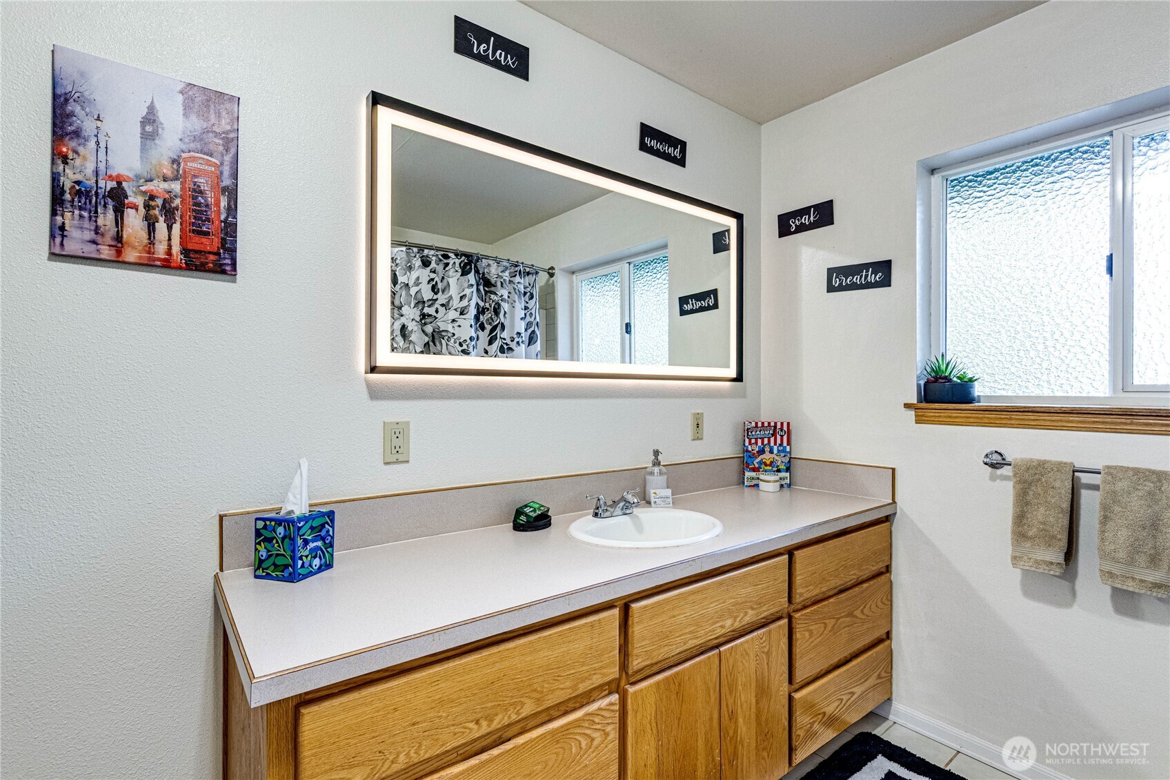 73 Ross Lane Port Angeles, WA 98363 - Photo 20 of 40 a bathroom with a sink and a mirror
