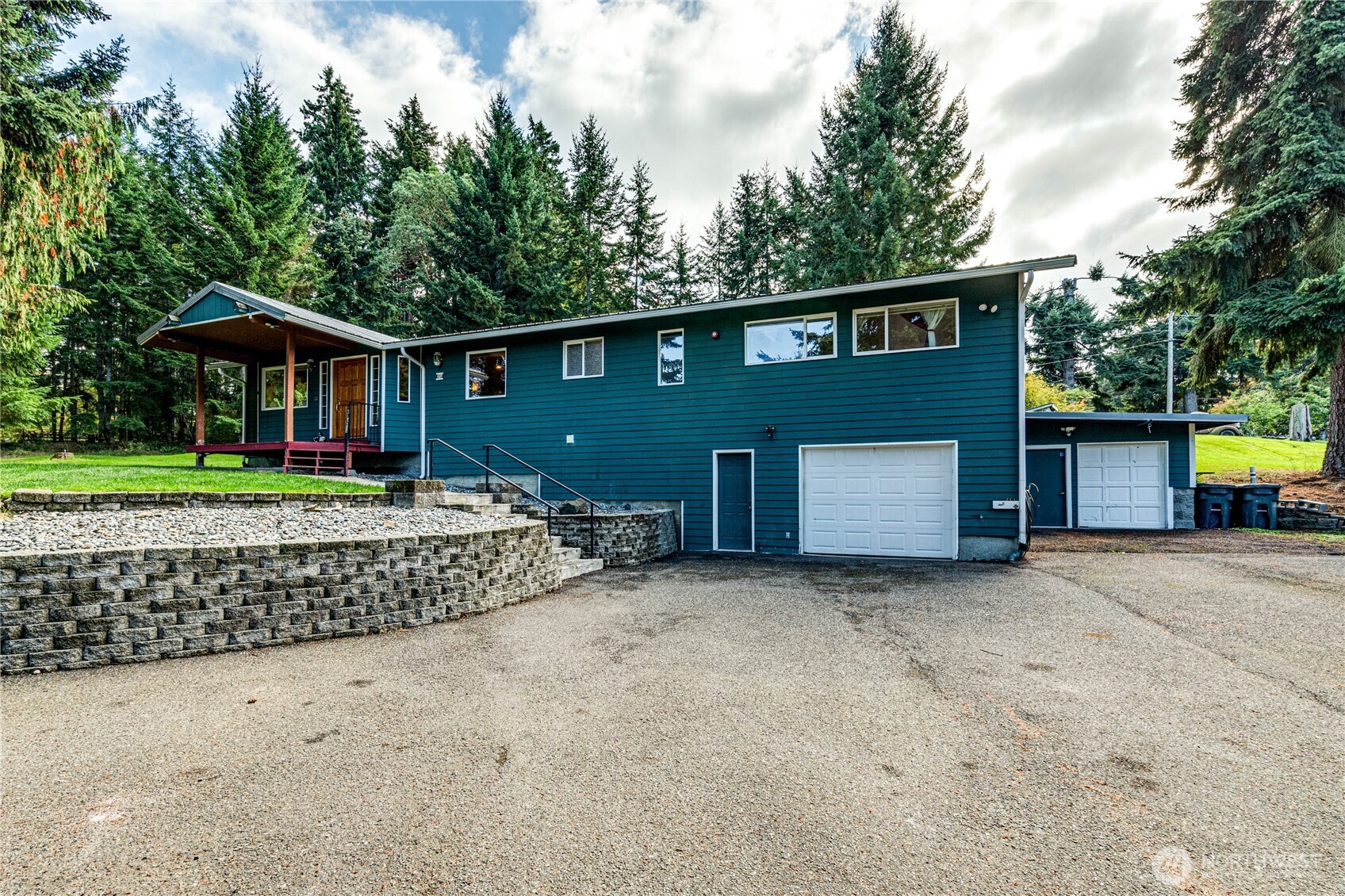 73 Ross Lane Port Angeles, WA 98363 - Photo 2 of 40 a front view of a house with garden