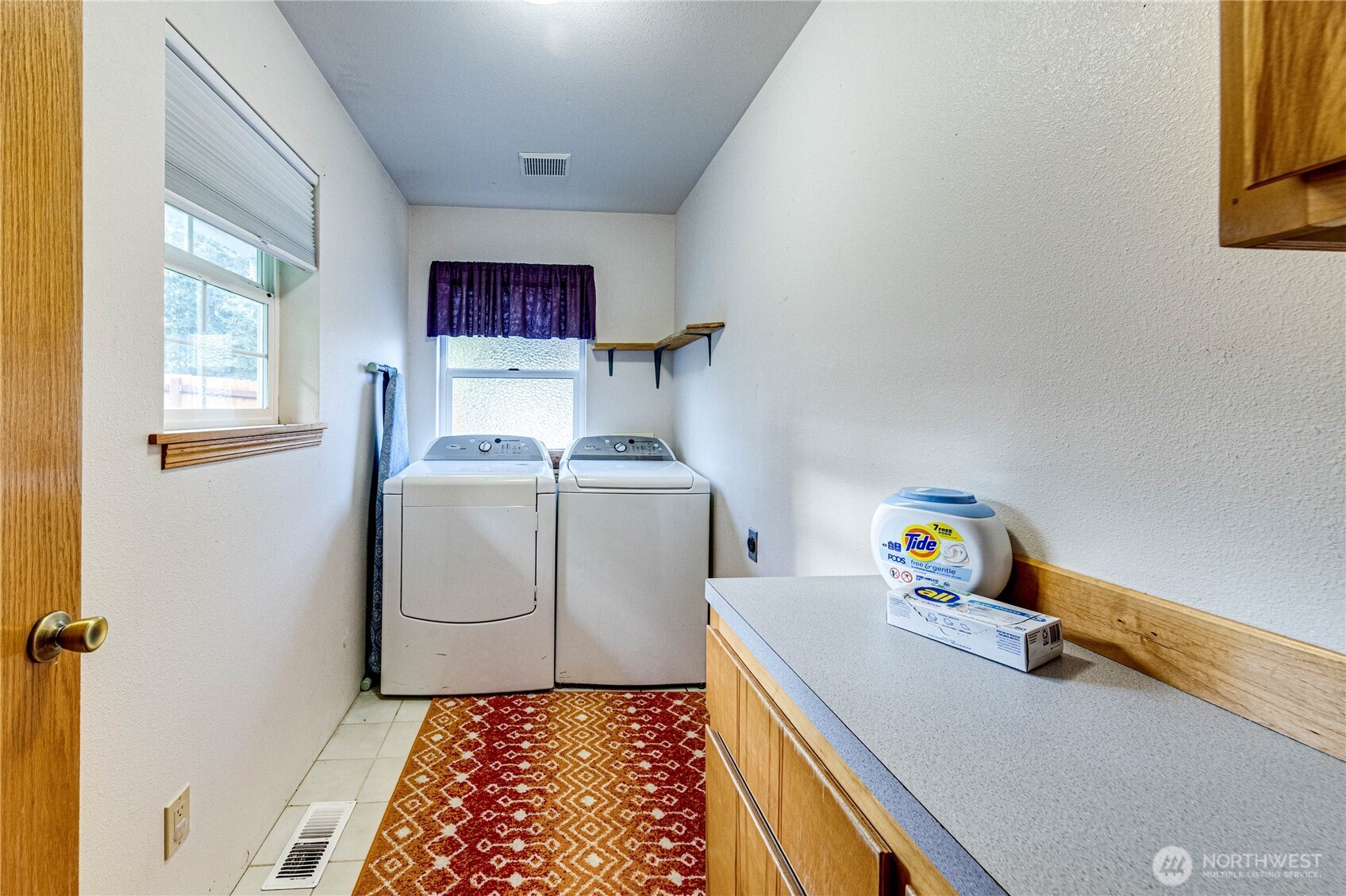 73 Ross Lane Port Angeles, WA 98363 - Photo 30 of 40 a room with storage and utility