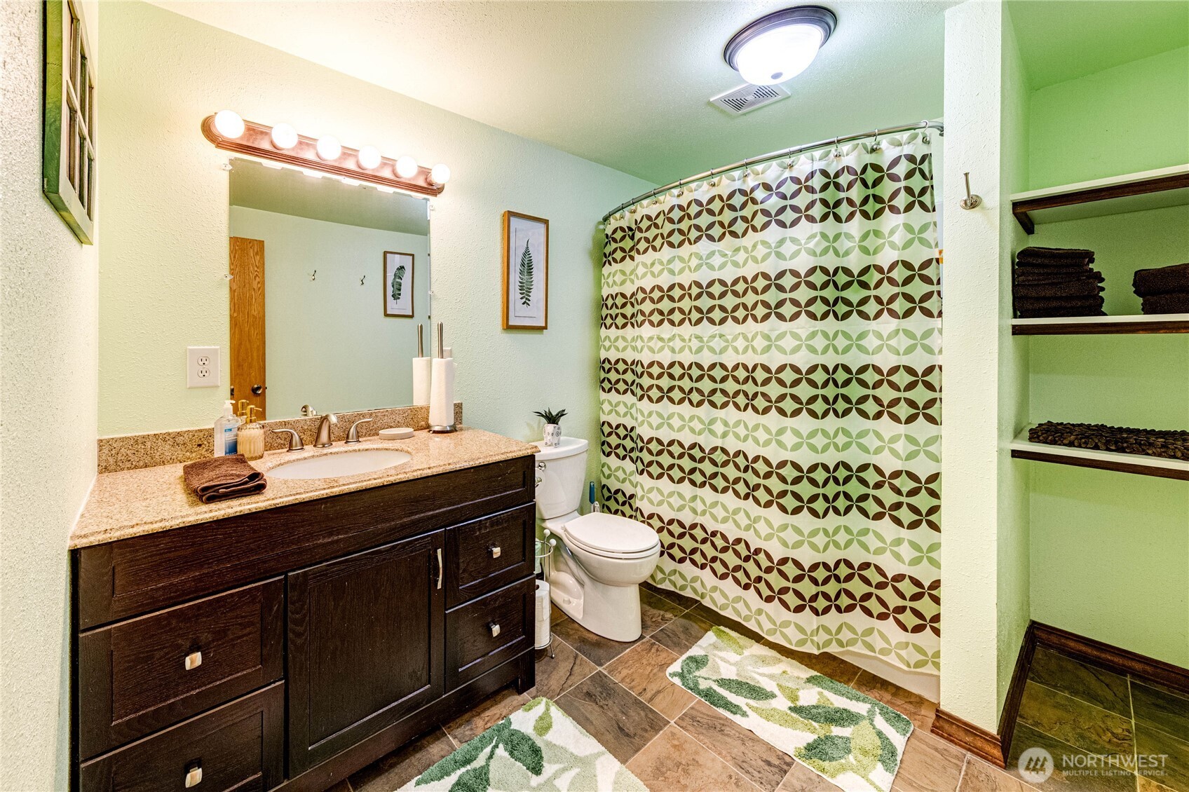 73 Ross Lane Port Angeles, WA 98363 - Photo 35 of 40 a bathroom with a double vanity sink toilet and shower