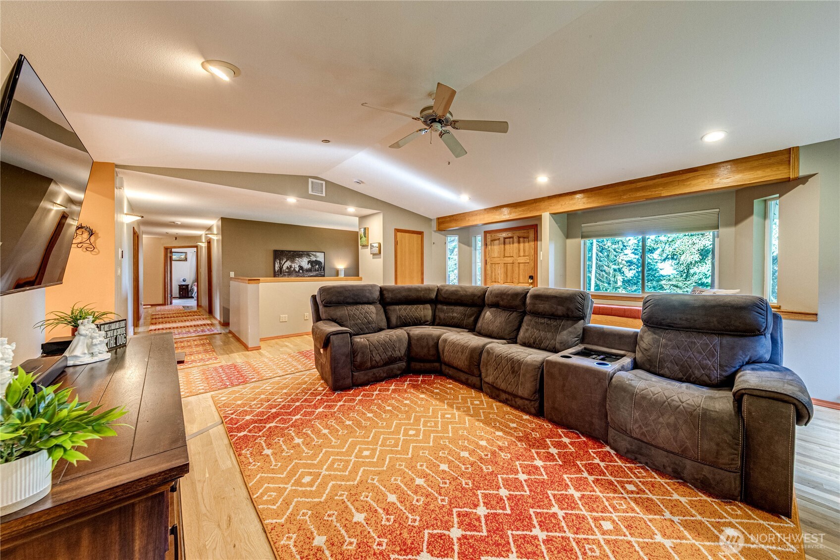 73 Ross Lane Port Angeles, WA 98363 - Photo 7 of 40 a living room with furniture and a flat screen tv