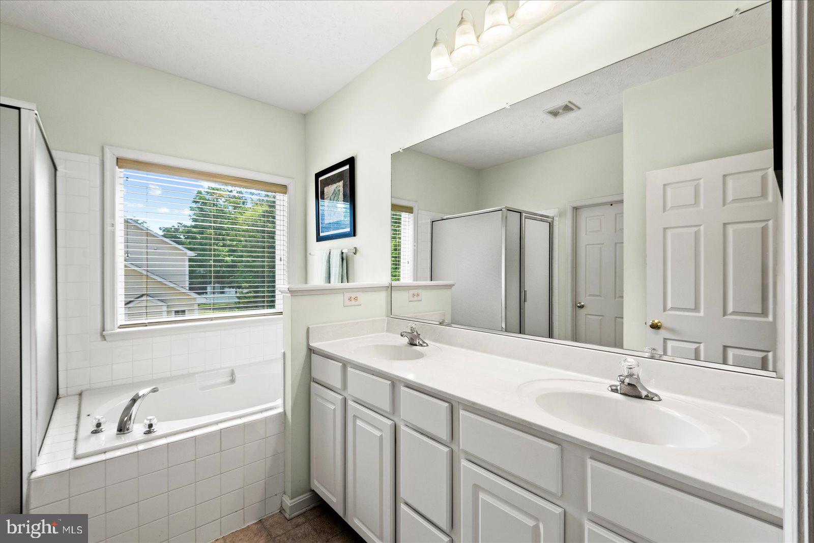 302 Forest Avenue Colonial Beach, VA 22443 - Photo 24 of 56 Ensuite in Master Bedroom with dual sinks