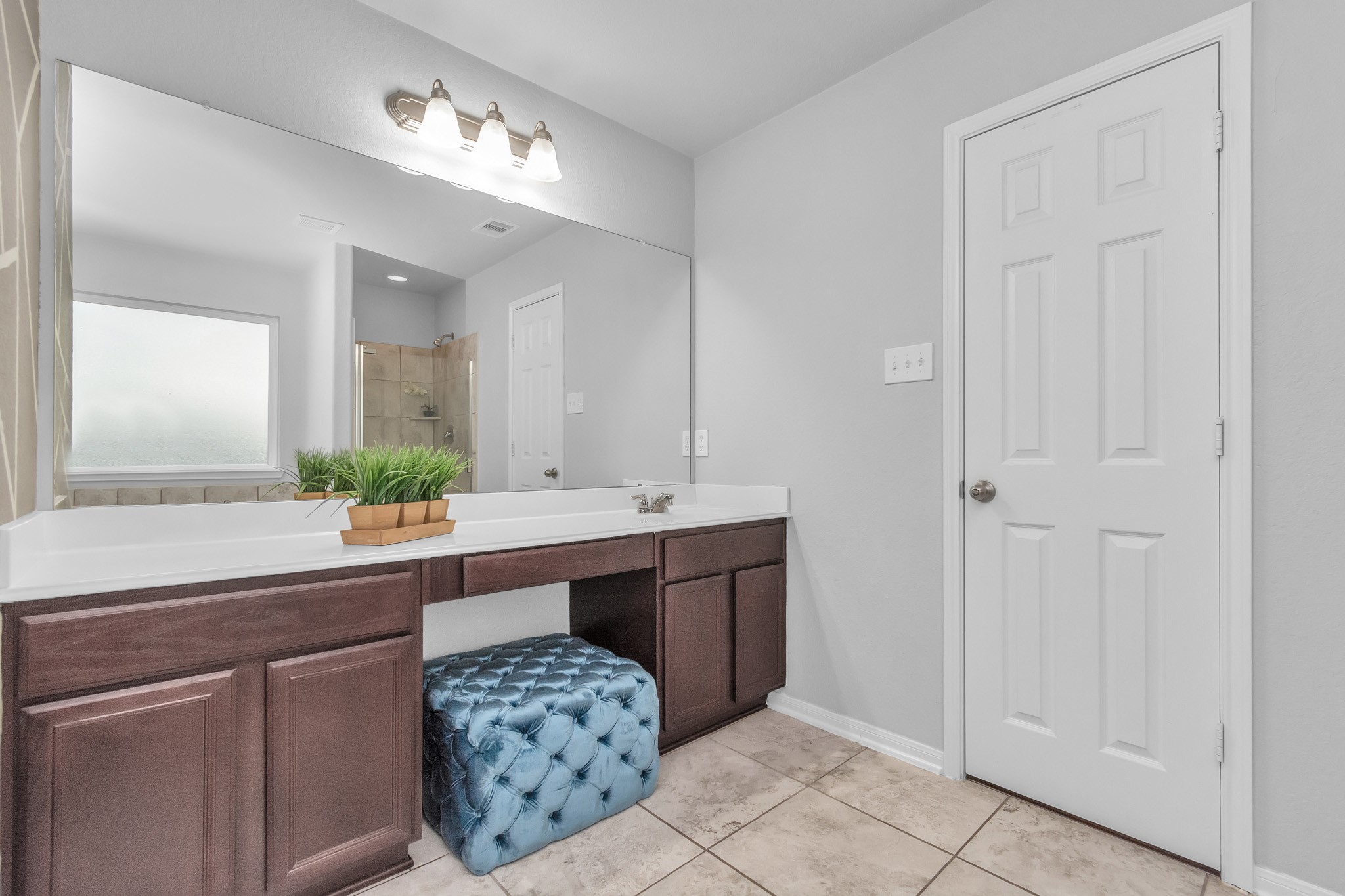 2411 Zephyr Lane Rosenberg, TX 77471 - Photo 16 of 20 a spacious bathroom with a sink and a mirror