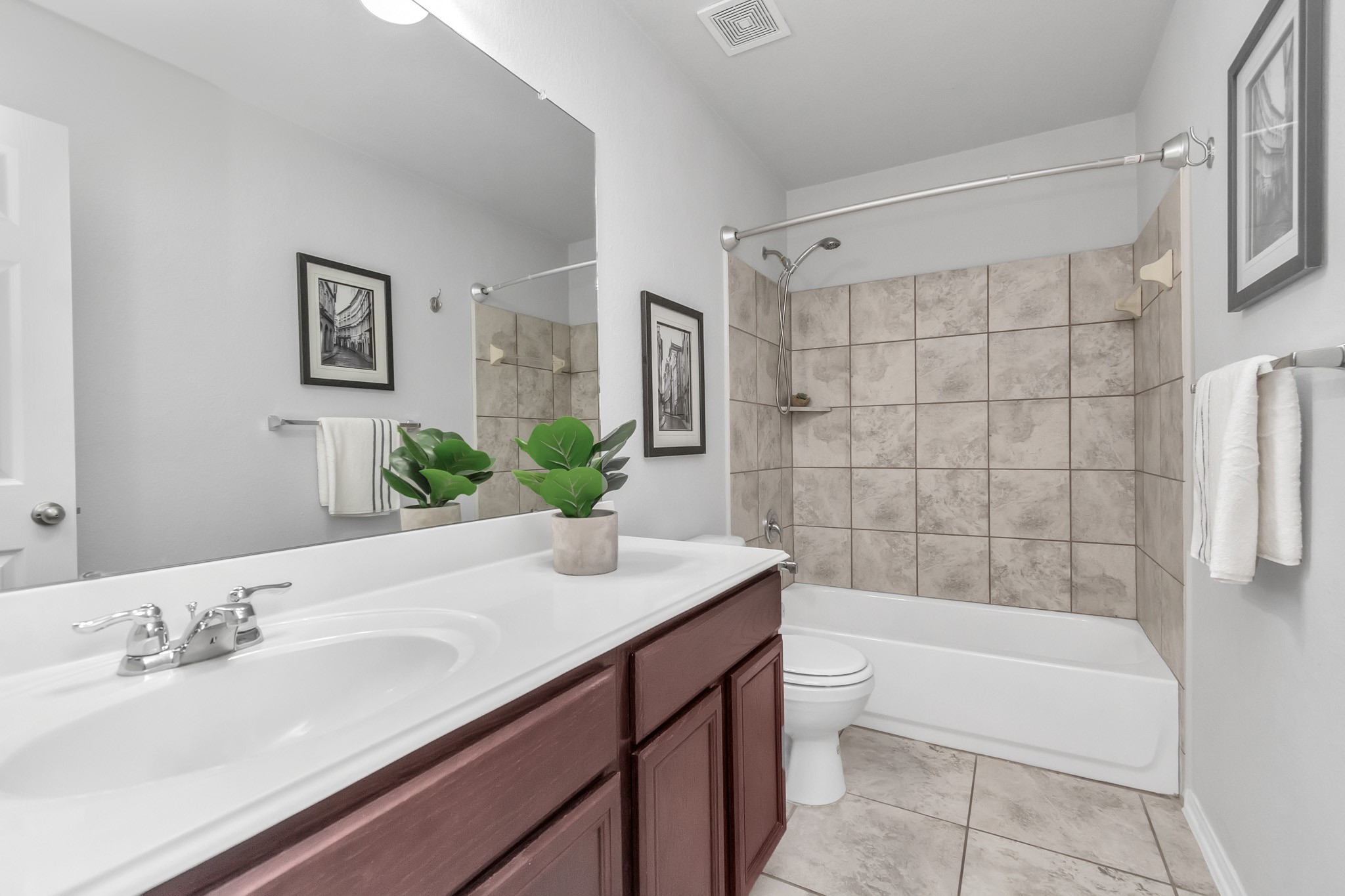 2411 Zephyr Lane Rosenberg, TX 77471 - Photo 17 of 20 a bathroom with a sink a toilet and shower