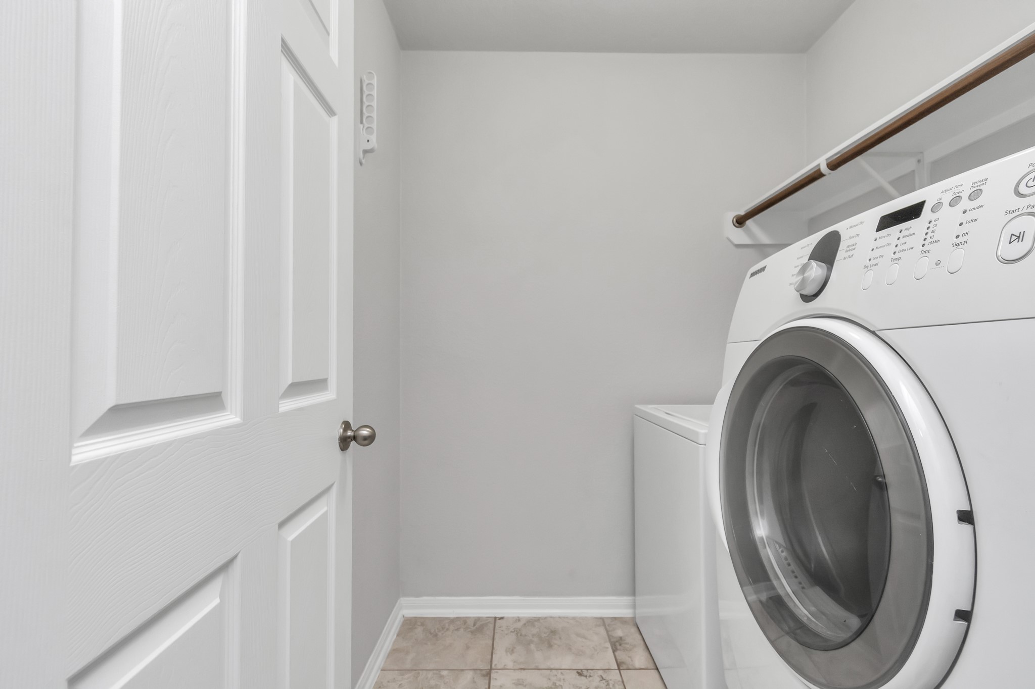 2411 Zephyr Lane Rosenberg, TX 77471 - Photo 20 of 20 a utility room with dryer and washer