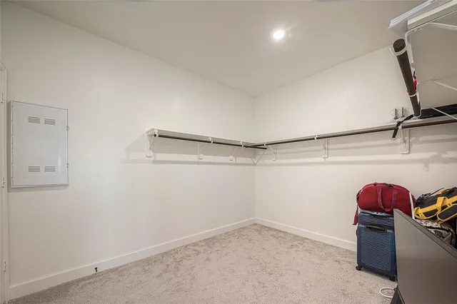a view of a room with racks on the wall