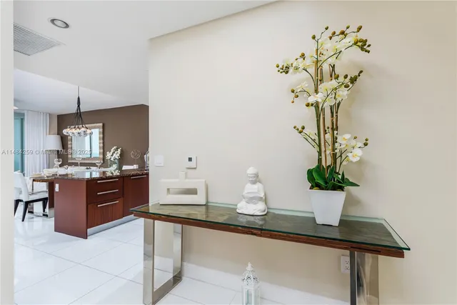 a view of kitchen with sink and window