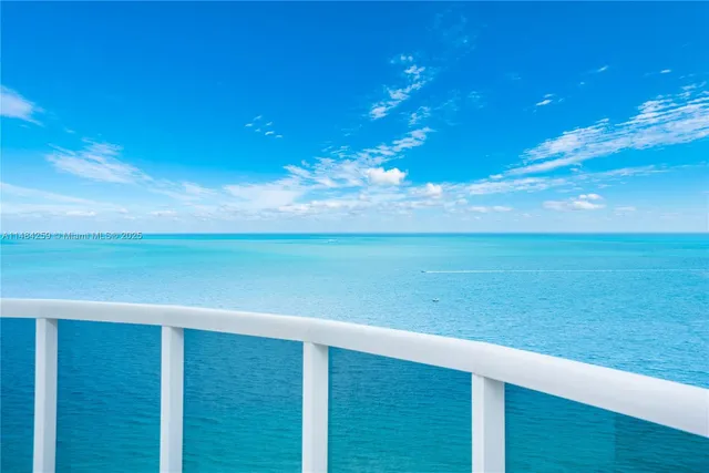 a view of an ocean from a balcony