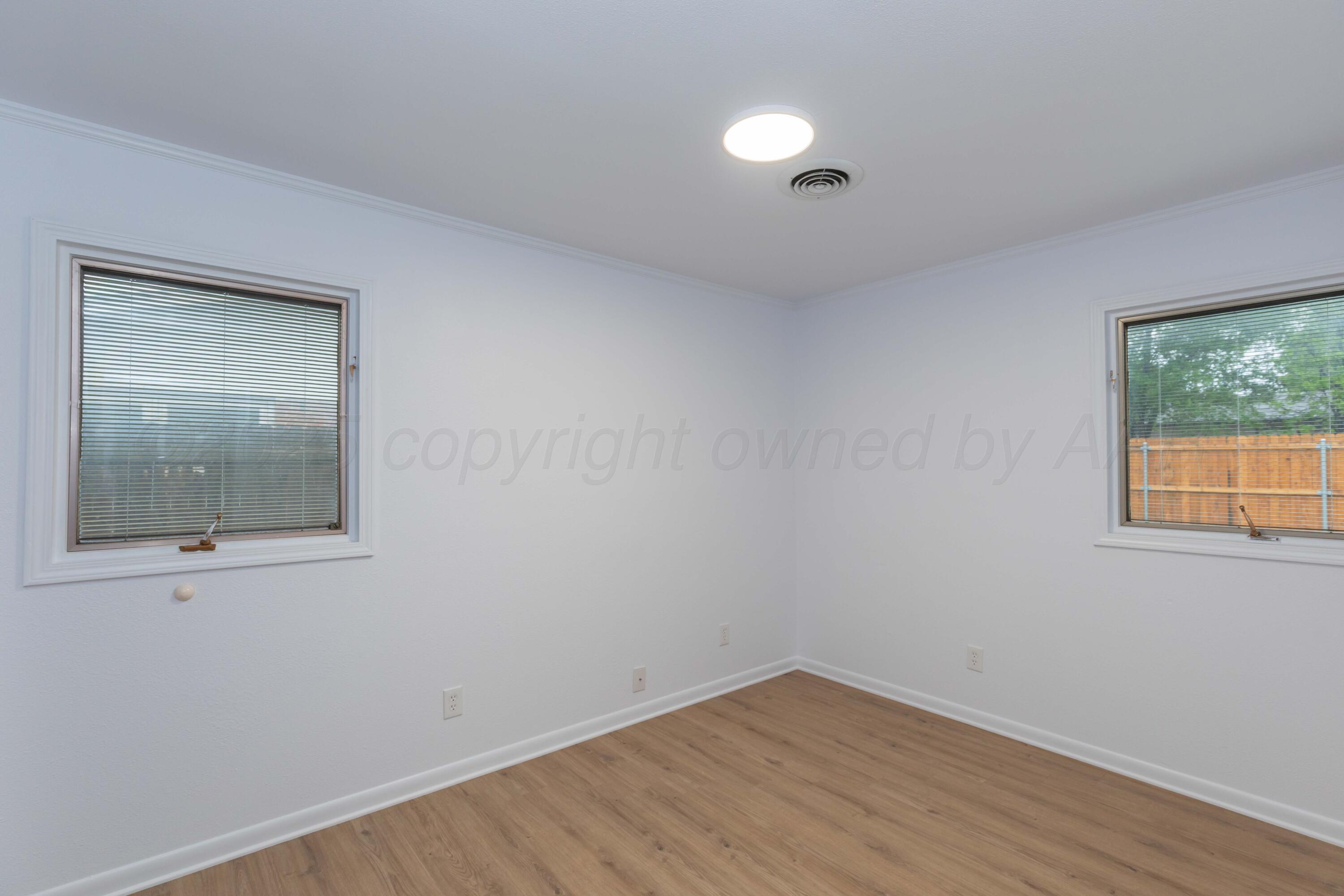 4708 South Lamar Street Amarillo, TX 79110 - Photo 29 of 40 an empty room with a window