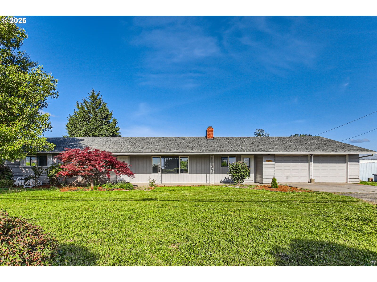 3131 Highway 47 Forest Grove, OR 97116 - Photo 3 of 30 a front view of a house with a garden