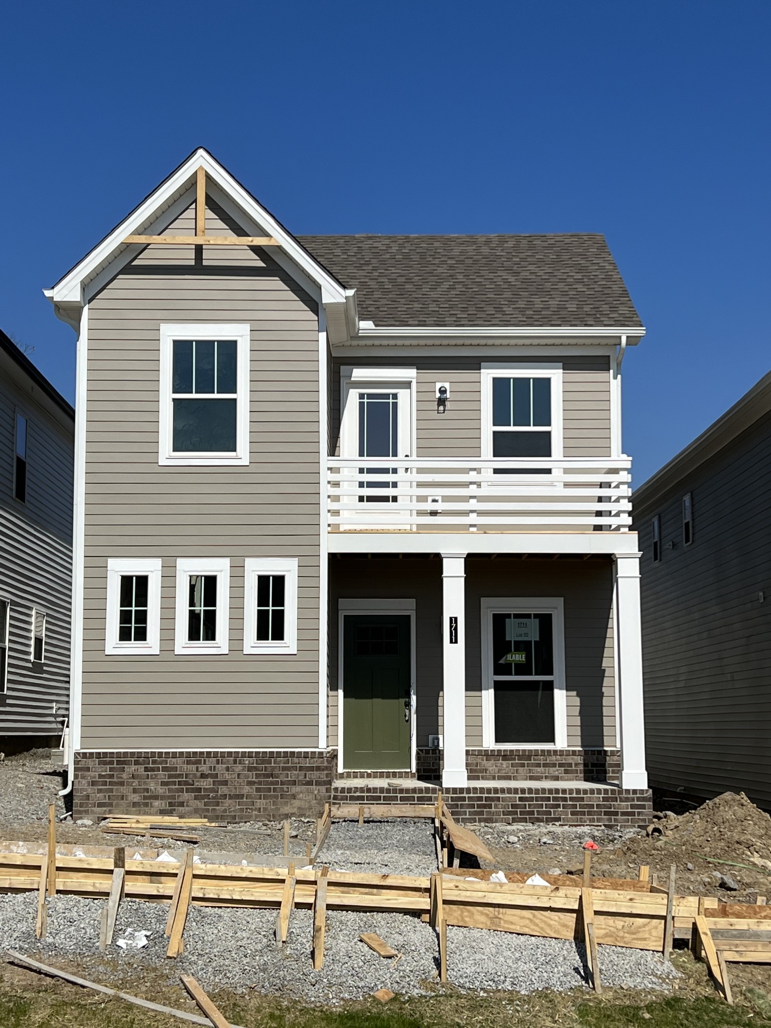 1711 Fenway Loop Antioch, TN 37013 - Photo 1 of 29 a front view of a house with street