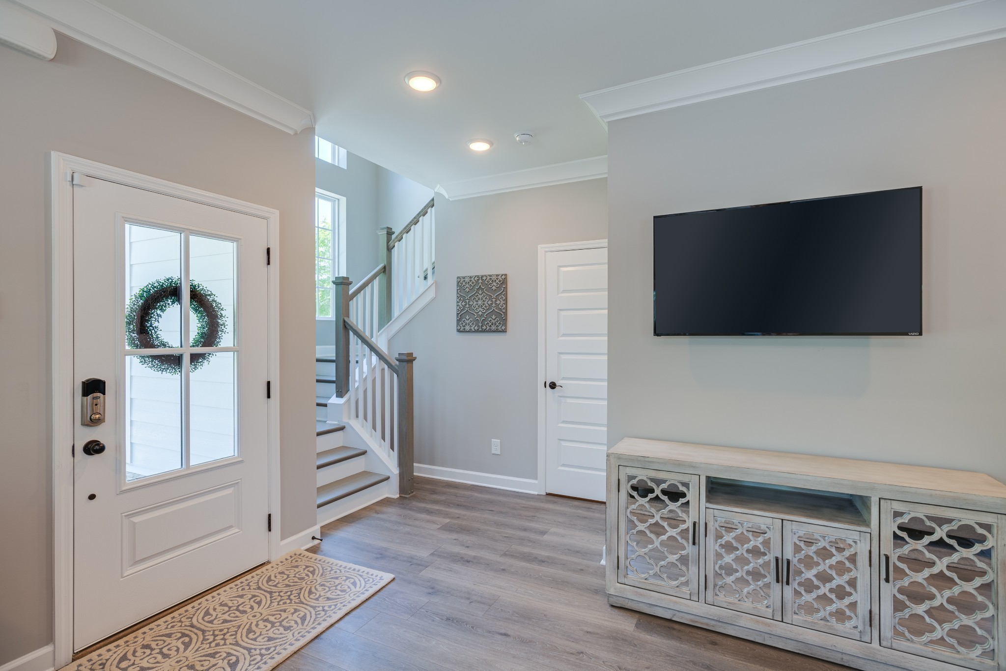 1711 Fenway Loop Antioch, TN 37013 - Photo 19 of 29 a living room with furniture and a flat screen tv