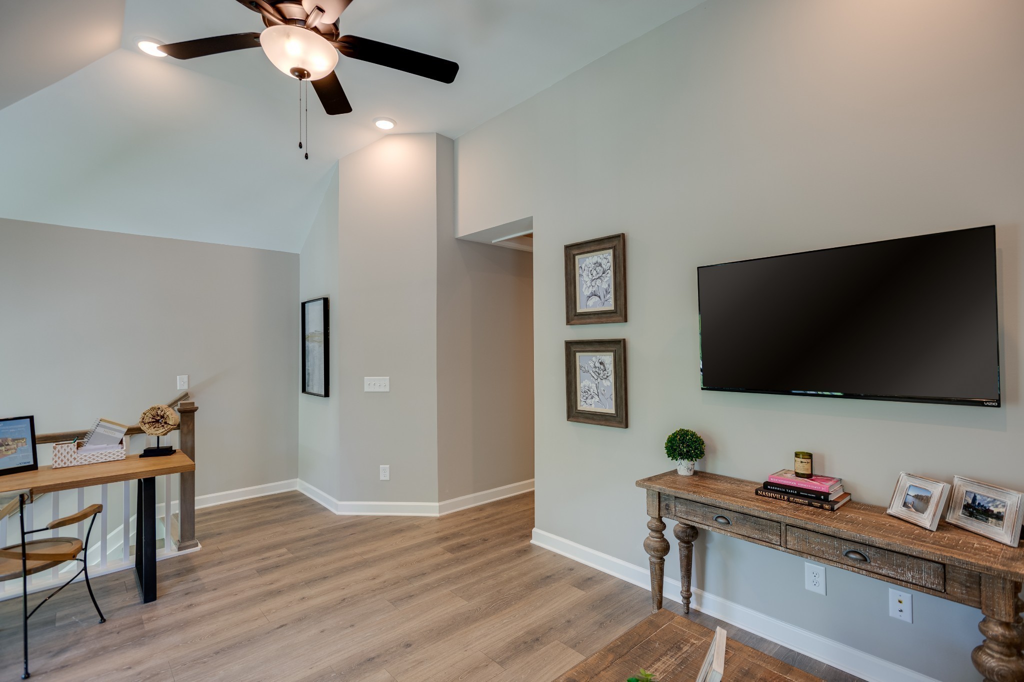 1711 Fenway Loop Antioch, TN 37013 - Photo 20 of 29 a living room with furniture and a flat screen tv