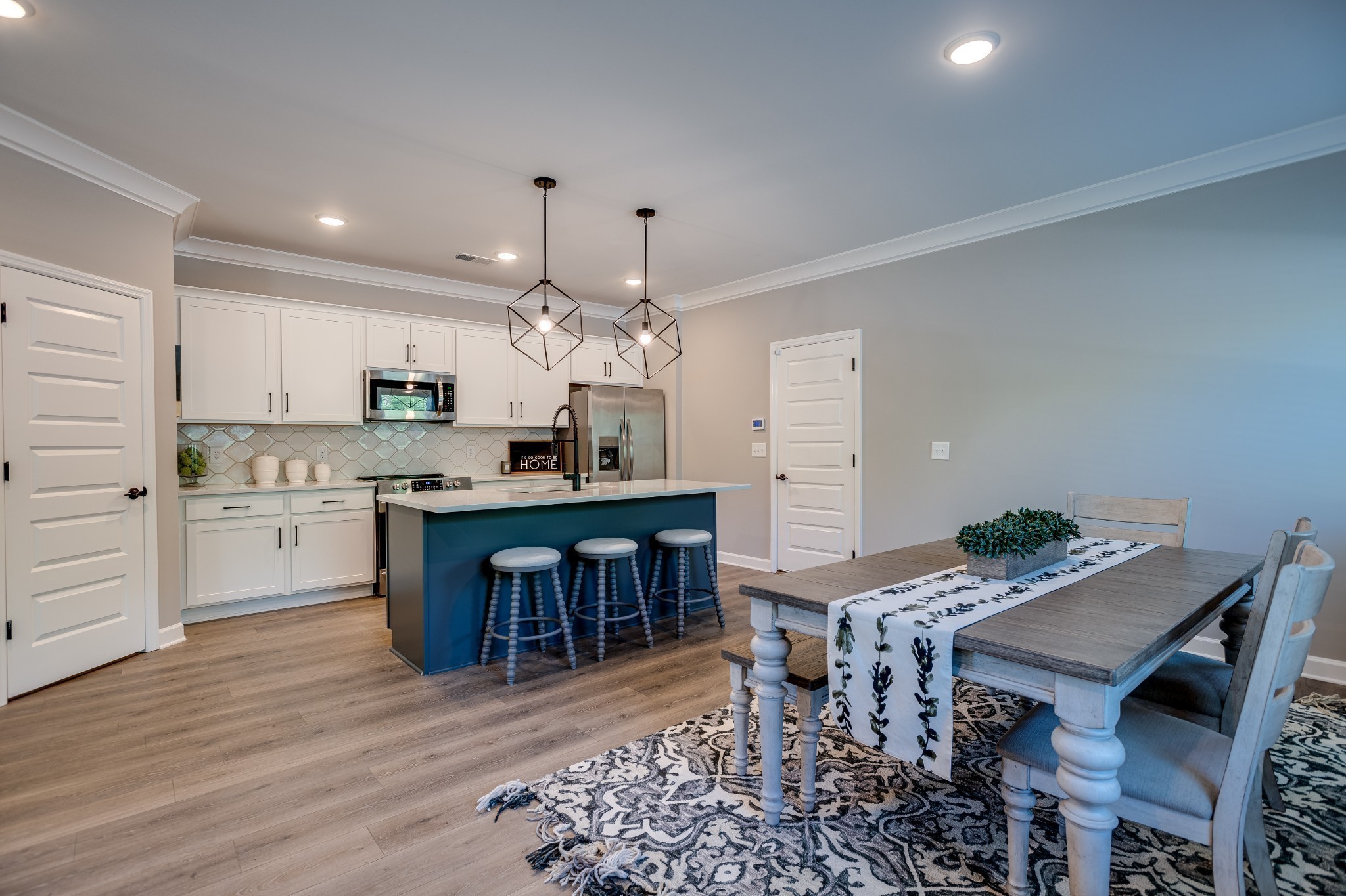 1711 Fenway Loop Antioch, TN 37013 - Photo 23 of 29 a kitchen with a table and chairs in it