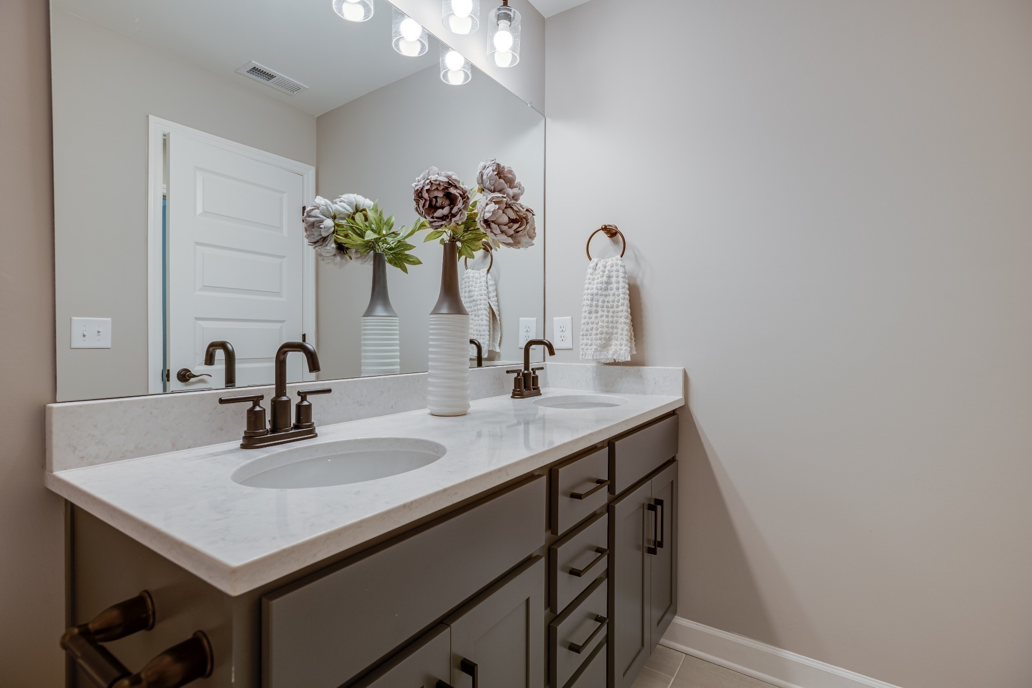 1711 Fenway Loop Antioch, TN 37013 - Photo 25 of 29 a bathroom with a sink a vanity and a mirror