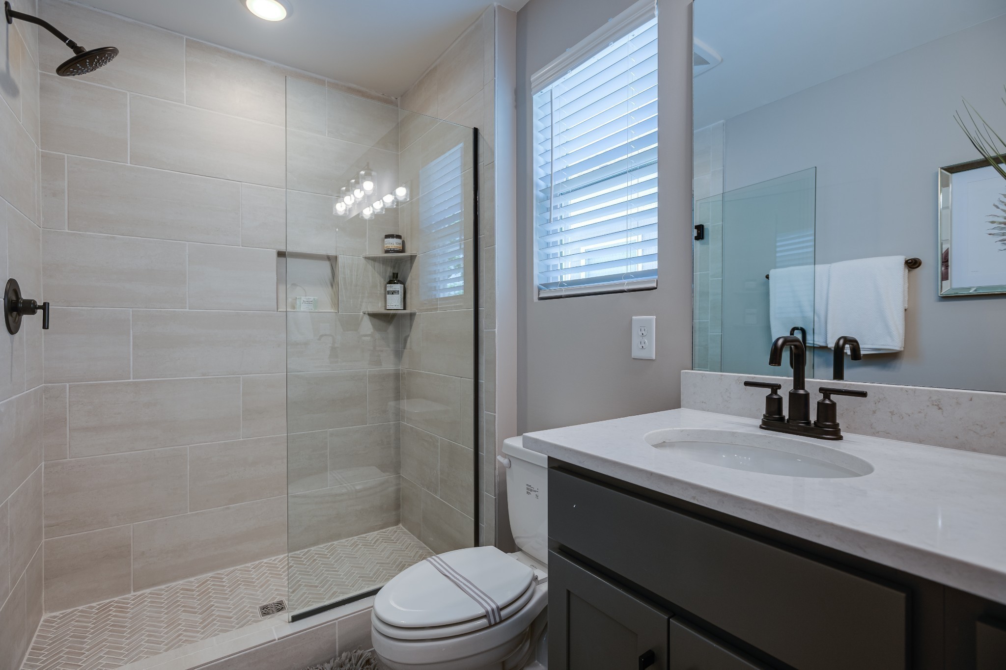 1711 Fenway Loop Antioch, TN 37013 - Photo 28 of 29 a bathroom with a sink a toilet and shower