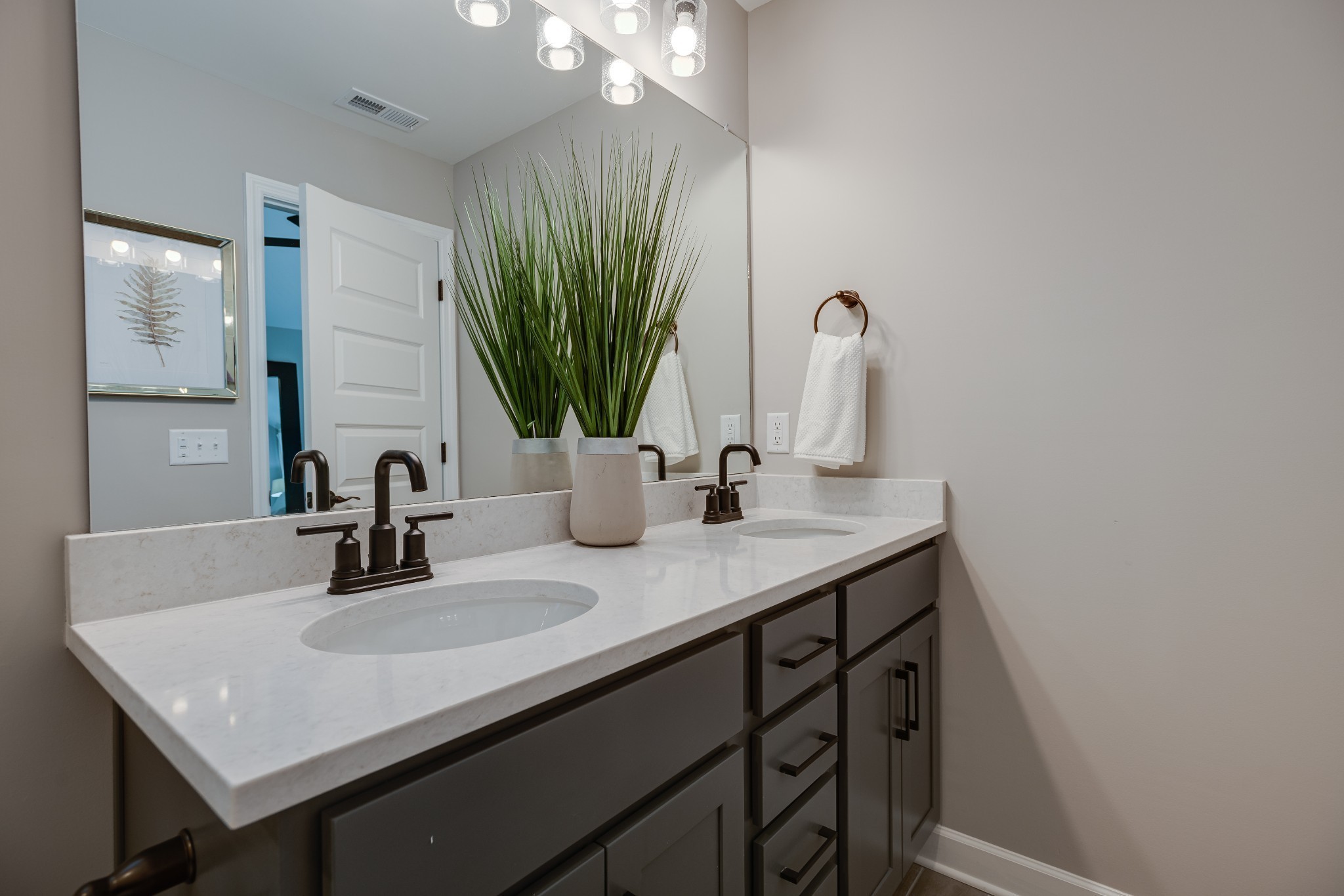 1711 Fenway Loop Antioch, TN 37013 - Photo 29 of 29 a bathroom with a sink vanity and a mirror