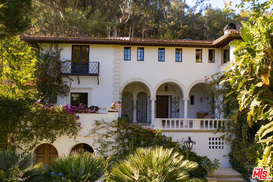 609 East Channel Road Santa Monica, CA 90402 - Photo 5 of 31 a front view of house with yard and trees around