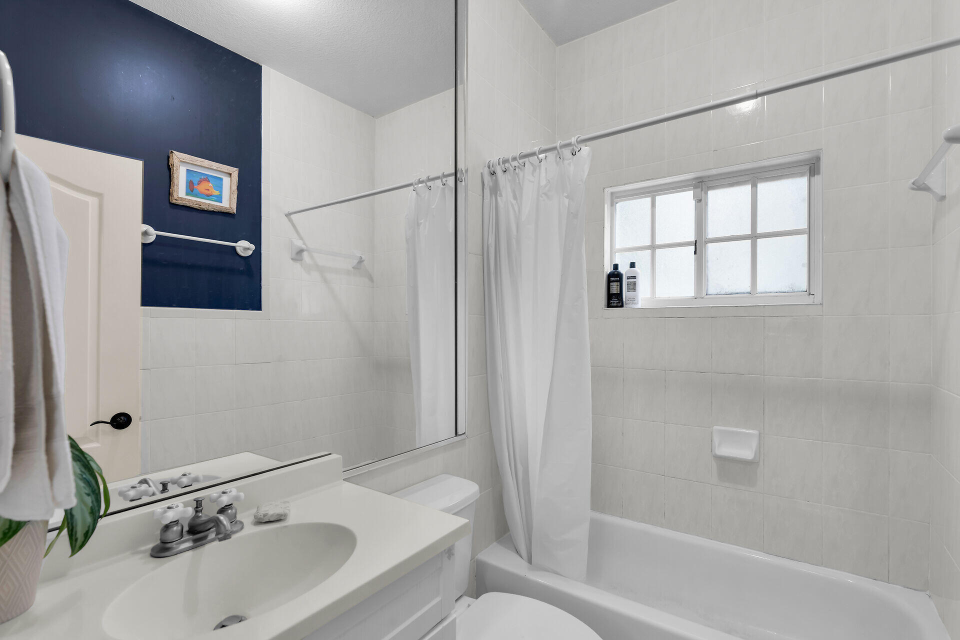 6 Fishermans Trail Key Largo, FL 33037 - Photo 25 of 41 a bathroom with a sink toilet and shower