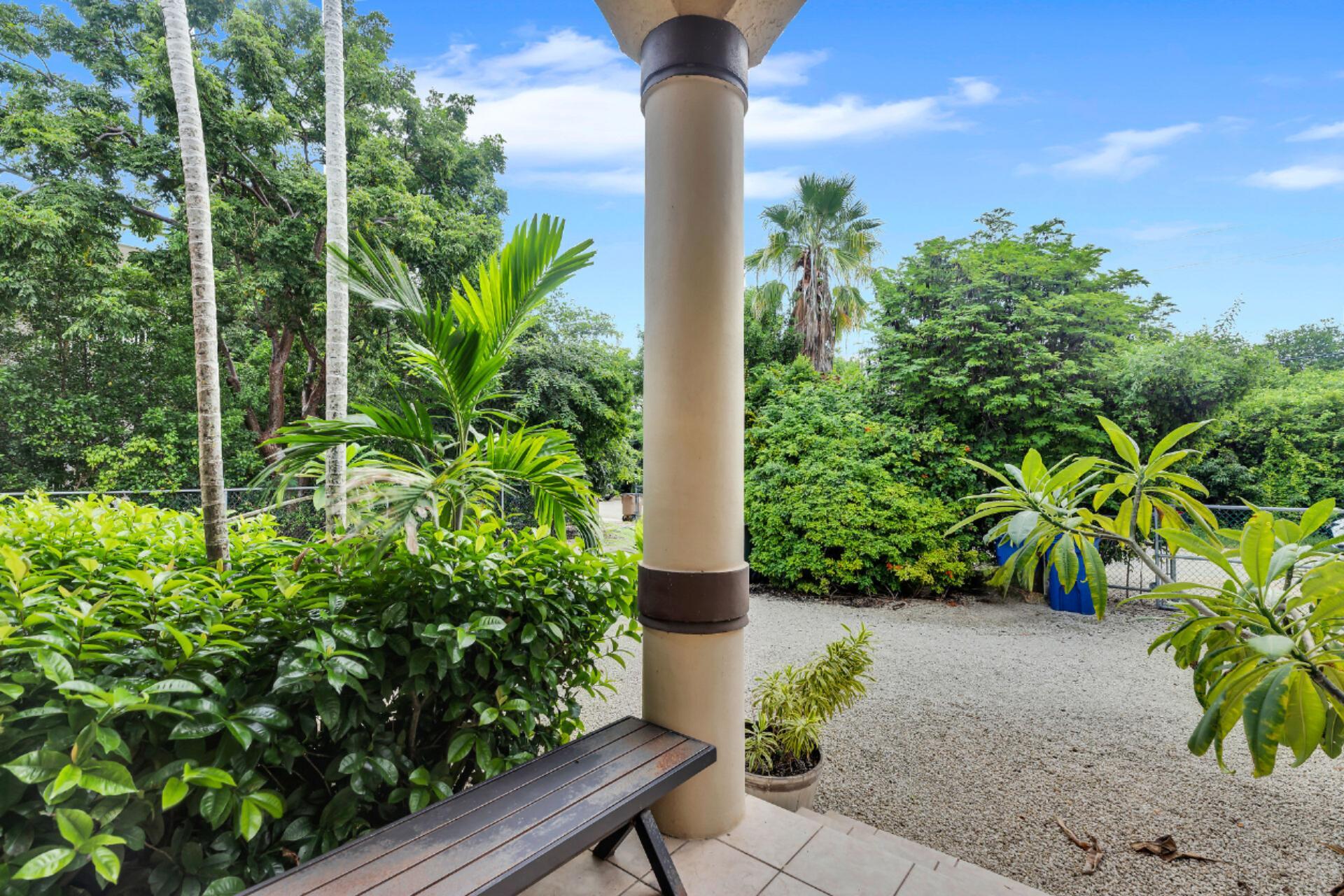 6 Fishermans Trail Key Largo, FL 33037 - Photo 33 of 41 a flower plants with wooden fence