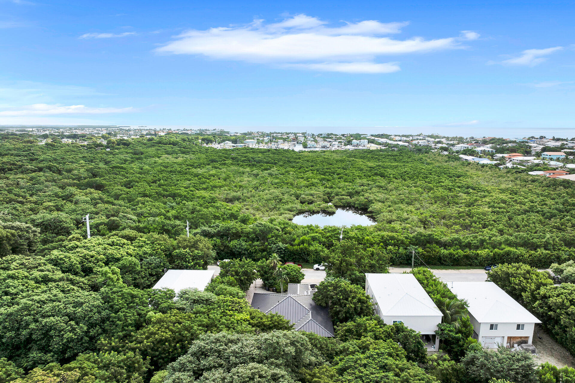 6 Fishermans Trail Key Largo, FL 33037 - Photo 36 of 41 an aerial view of residential houses with outdoor space and trees