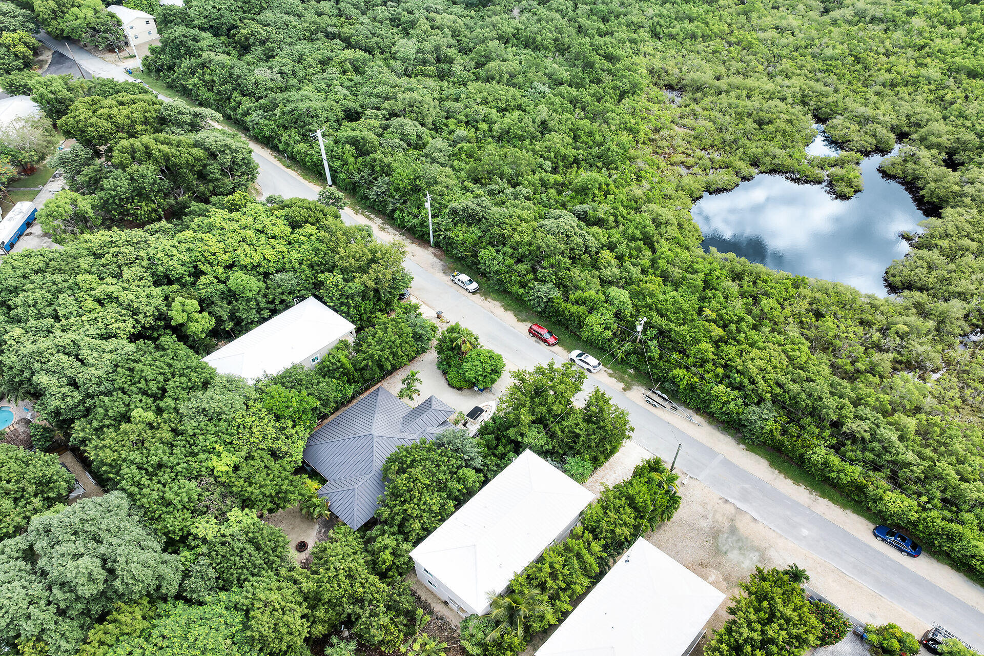 6 Fishermans Trail Key Largo, FL 33037 - Photo 38 of 41 an aerial view of a house with outdoor space and street view