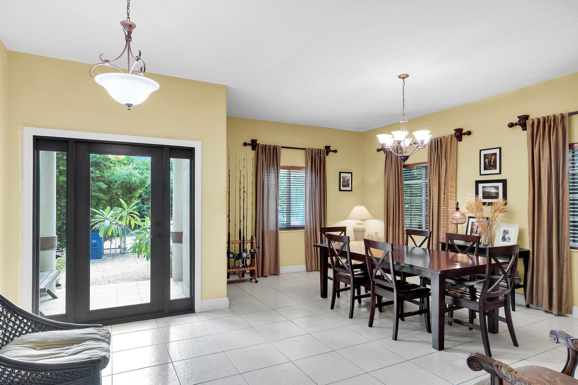 6 Fishermans Trail Key Largo, FL 33037 - Photo 4 of 41 a view of a dining room with furniture and chandelier