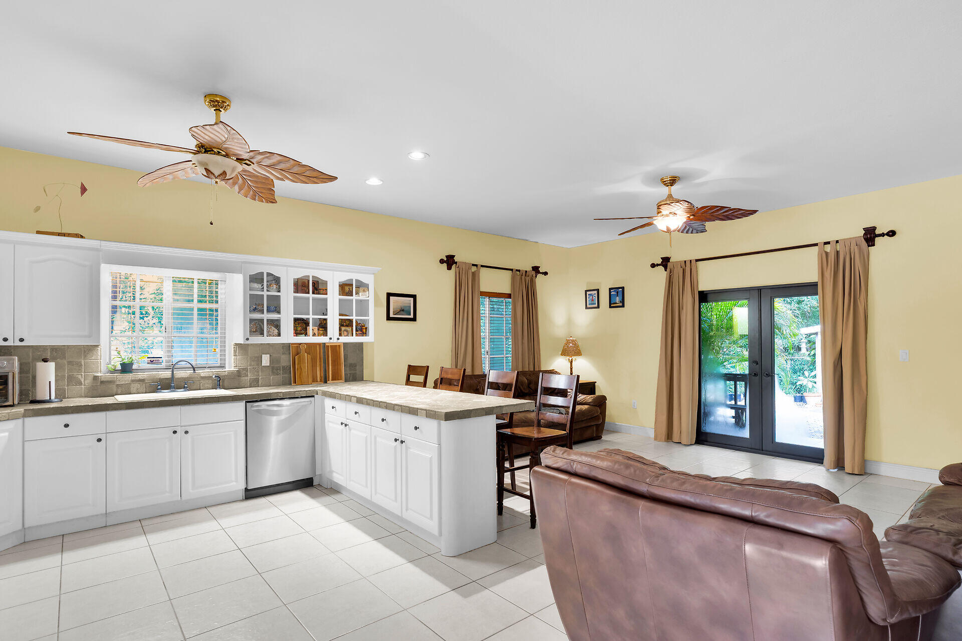 6 Fishermans Trail Key Largo, FL 33037 - Photo 7 of 41 a kitchen with a sink stove and cabinets