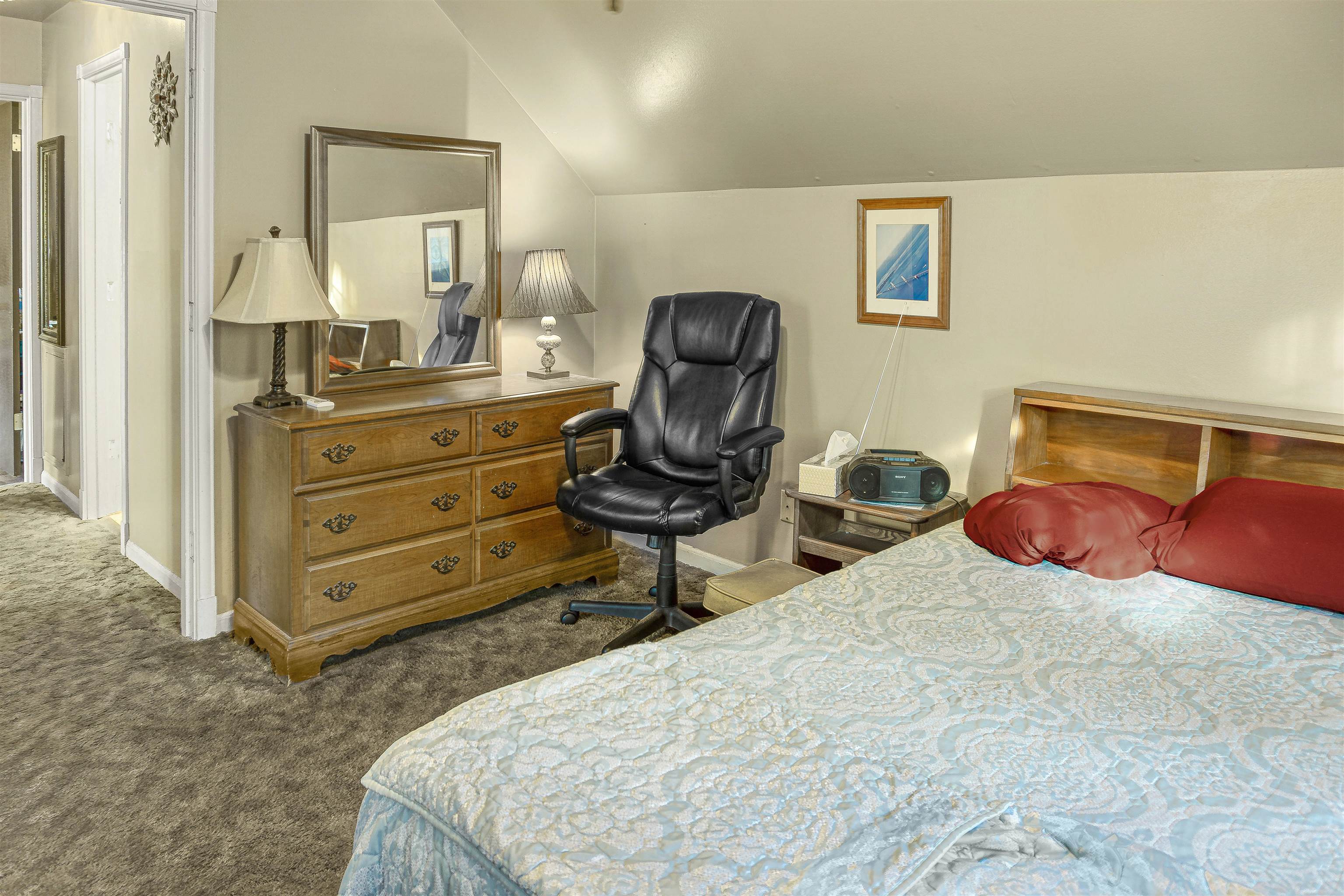 4508 Yale Road Memphis, TN 38128 - Photo 13 of 19 a bedroom with a bed and a mirror
