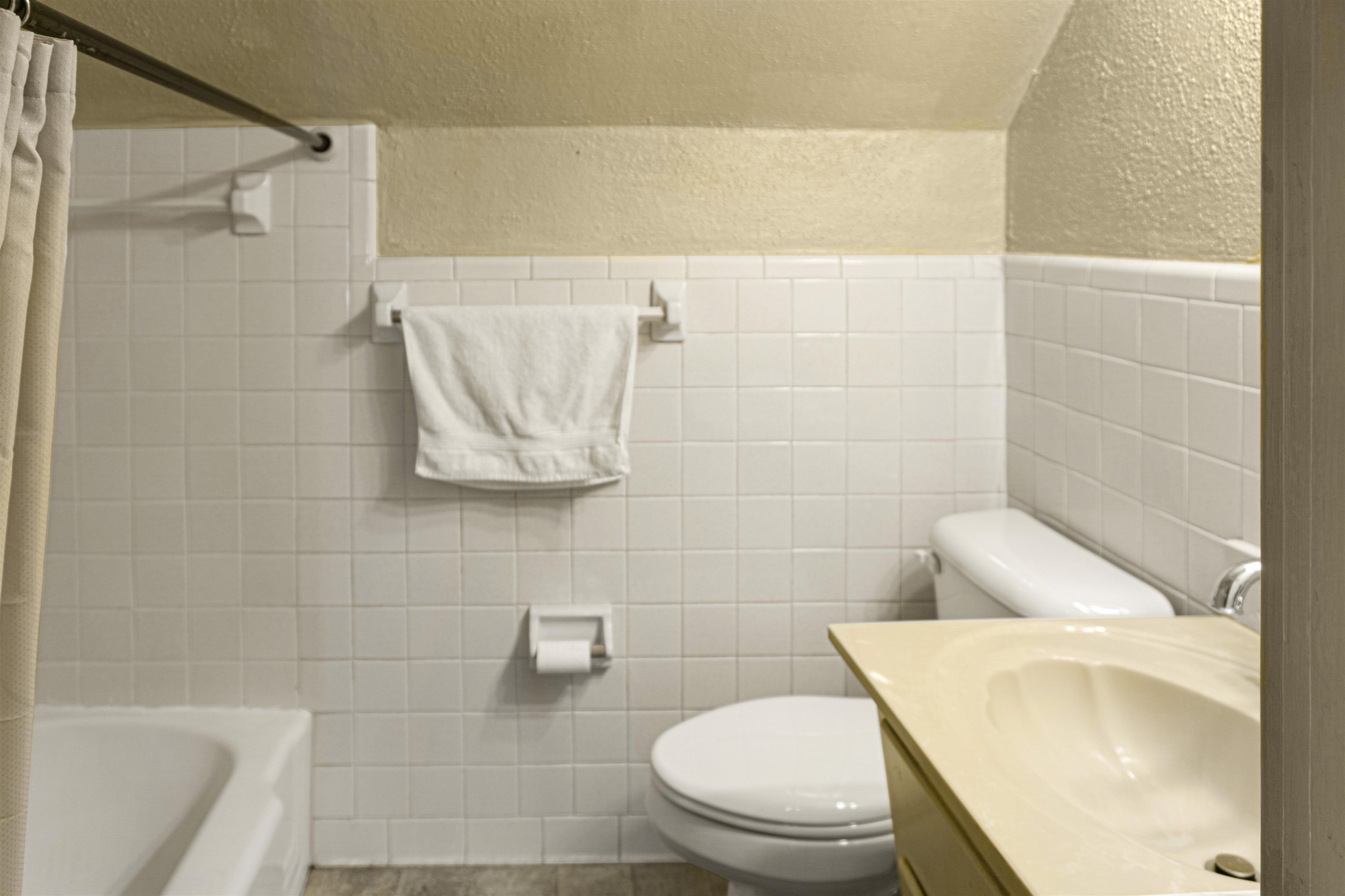4508 Yale Road Memphis, TN 38128 - Photo 15 of 19 a bathroom with a toilet and sink